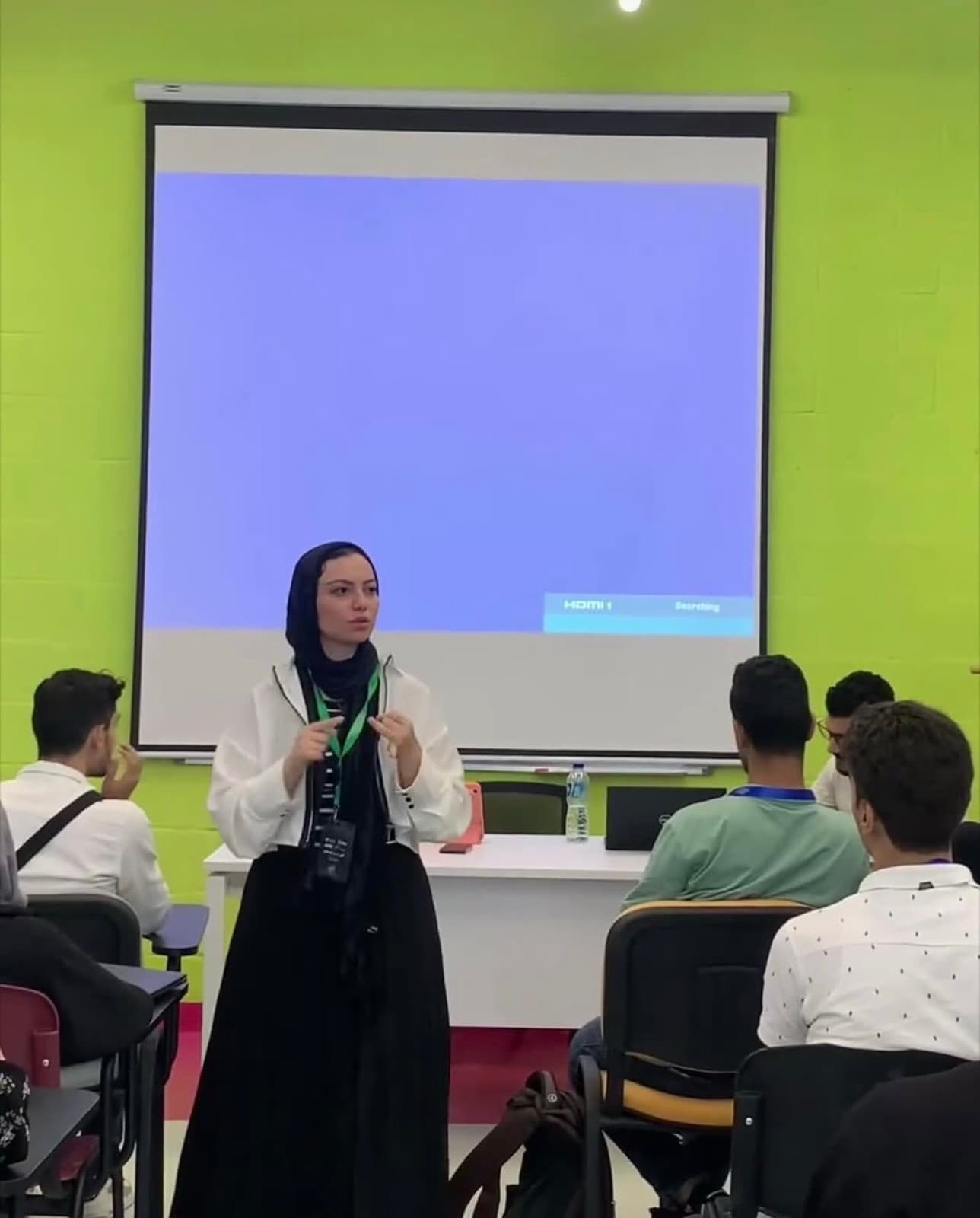 Mariam speaking to a student audience